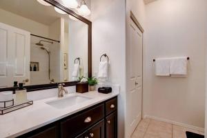 a bathroom with a sink and a large mirror at Sedona Retreat W/ Tesla Mobile Charger in Sedona +22 photos