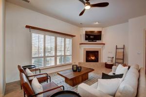 a living room with a couch and a fireplace at Sedona Retreat W/ Tesla Mobile Charger in Sedona