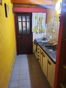 Køkken eller tekøkken på Las Toninas Duplex 5