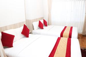 Una cama o camas en una habitación de Hotel Prime Suite