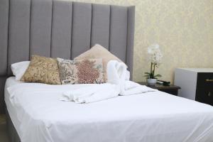 Postel nebo postele na pokoji v ubytování Hotel Boutique Casa Umiña