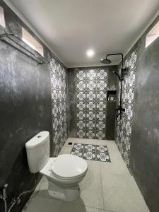 Koupelna v ubytování Oemah Gebagan 78 Pertiwi Room