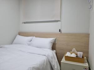 Postel nebo postele na pokoji v ubytování J5 Hostel