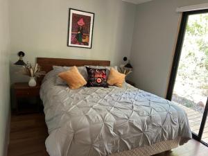 Postel nebo postele na pokoji v ubytování Casa Maqui