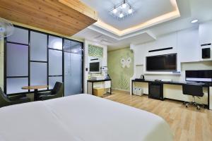 Kuchyň nebo kuchyňský kout v ubytování G&G Hotel