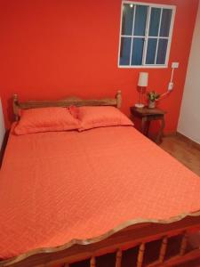 En eller flere senge i et værelse på Casa Topacio 1