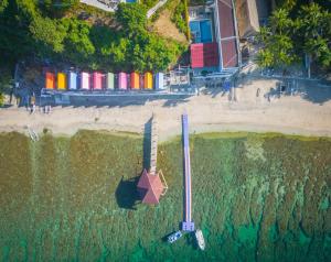 an aerial view of a beach with a building at Destino Beach Resort and Hotel in Batangas City +54 photos