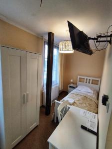 Postel nebo postele na pokoji v ubytování Motel Tower