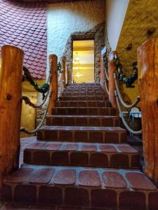 a set of stairs leading up to a door at Motel Tower in Toruń