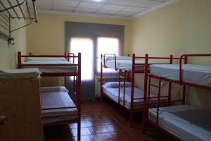 Postel nebo postele na pokoji v ubytování Albergue Los Chorros