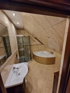 Ванная комната в Apartamenty Monti