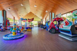 a room filled with lots of different types of rides at Kustur Club Holiday Village - All Inclusive in Kusadası