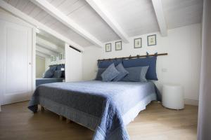Кровать или кровати в номере Residenza dei Suoni
