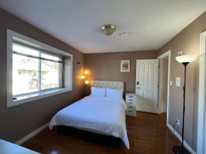 Postel nebo postele na pokoji v ubytování Comfortable Utopia B&B