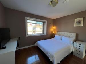 Postel nebo postele na pokoji v ubytování Comfortable Utopia B&B