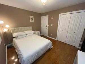 Postel nebo postele na pokoji v ubytování Comfortable Utopia B&B