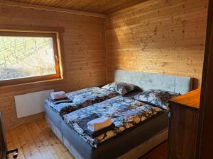 Postel nebo postele na pokoji v ubytování Ferienhaus Maximilian