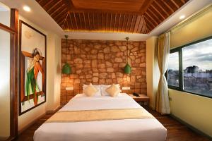 Voodi või voodid majutusasutuse Woodapple Hotel and Spa toas