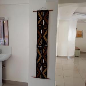 Koupelna v ubytování POPSY HOMES NAKURU CBD + 29 fotografií