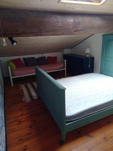 Katil atau katil-katil dalam bilik di Gite du p'tit fermier