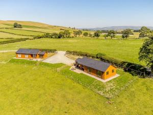 an overhead view of a house in a field at 2 Bed in Llandrindod Wells 89064 in Nantmel