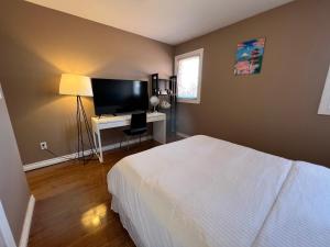 Postel nebo postele na pokoji v ubytování Comfortable Utopia B&B