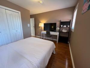 Postel nebo postele na pokoji v ubytování Comfortable Utopia B&B