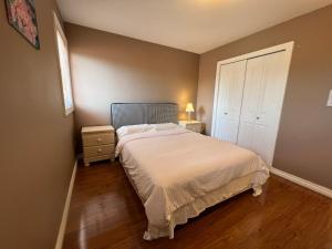 Postel nebo postele na pokoji v ubytování Comfortable Utopia B&B