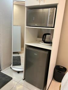 Kuchyň nebo kuchyňský kout v ubytování Le Rosette Residence + 6 fotografií