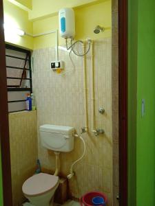 ห้องน้ำของ BhoboGHURE HomeSTAY Santiniketan