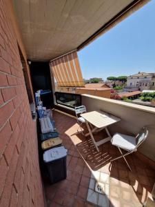 Rõdu või terrass majutusasutuses Terrazza a Nettuno e Chiesa Giubilare Santa Maria Goretti