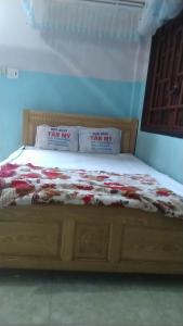 Krevet ili kreveti u jedinici u objektu Nhà Nghỉ Tân Mỹ