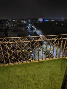 a view of a bridge over a river at night at Aesthetic Scenic Luxurious Apartment - Bahria Heights in Rawalpindi