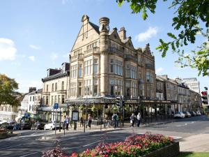 a large building on a street in a city at 2 Bed in Harrogate 74981 in Harrogate