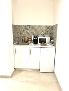 Köök või kööginurk majutusasutuses Dorant Charme&Rooms