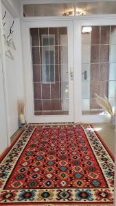 a room with a rug in front of a door at Appartment B 40 in Pirmasens