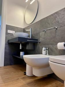 Koupelna v ubytování CASA VACANZE LA BRENTA + 33 fotografií