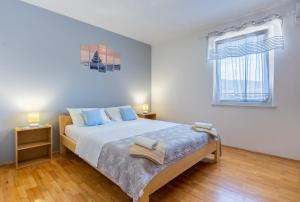 Ліжко або ліжка в номері Apartment Kristian