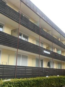 a large building with a balcony on the side of it at Appartement Sternblick in Bad Reichenhall