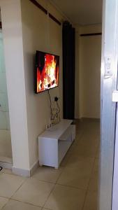 TV i/ili multimedijalni sistem u objektu Carley's comfort home