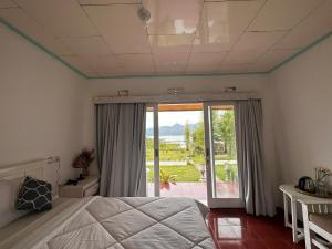 Postel nebo postele na pokoji v ubytování Gill Lake Batur