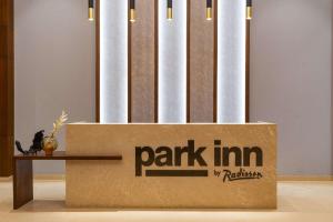a box with a park inc sign on it at Park Inn by Radisson Ayodhya in Ayodhya