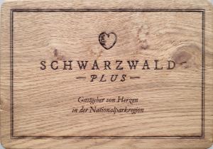 a wooden box with a heart on top of it at Ferienhaus Lacher in Baiersbronn