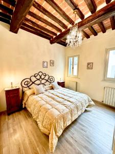 Säng eller sängar i ett rum på Casa Ambra