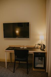 TV a/nebo společenská místnost v ubytování Coop Hotell