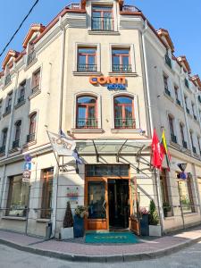 a building with a sign on the front of it at CONTI HOTEL VILNIUS, Conference Centre, Restaurant & Bar in Vilnius