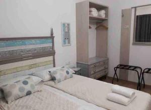 Posteľ alebo postele v izbe v ubytovaní Oak Palace Oakplacescom