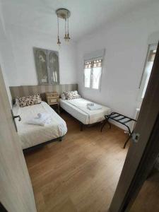 Posteľ alebo postele v izbe v ubytovaní Oak Palace Oakplacescom
