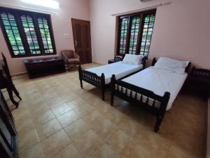 Φωτογραφία από το άλμπουμ του Ashtamudi Homes σε Kollam