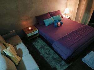 A bed or beds in a room at 体验奢华与宁静的缩影星空灯 电影房 Nexflix 500网速